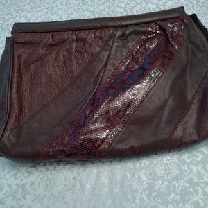 PIONEER brand clutch bag in BURGANDY . 9"h x 13"w.